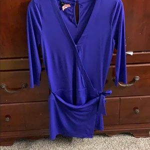 Bebe romper- wraps dress front  LIKE NEW